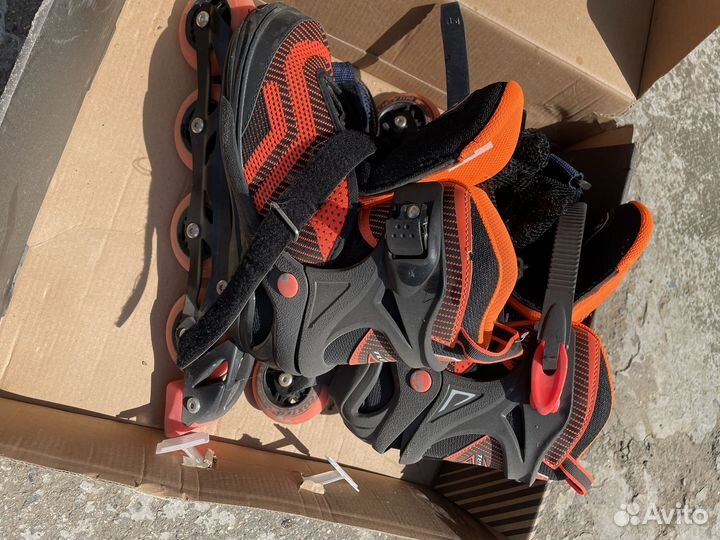 Роликовые коньки