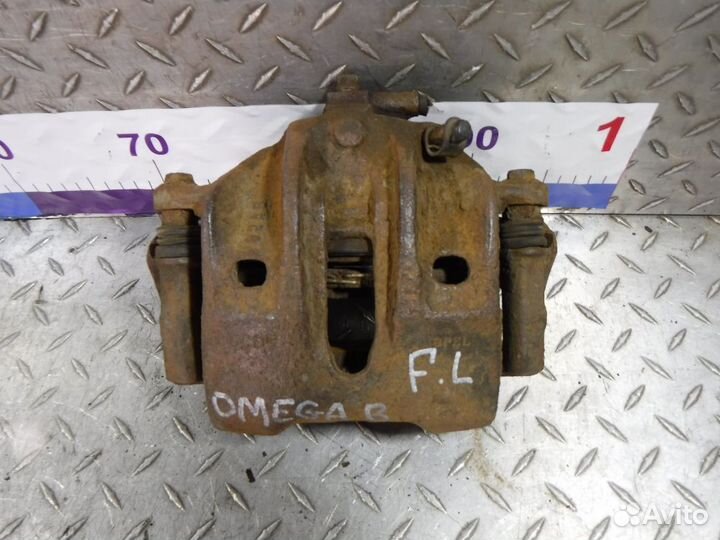 Суппорт передний левый Opel Omega B