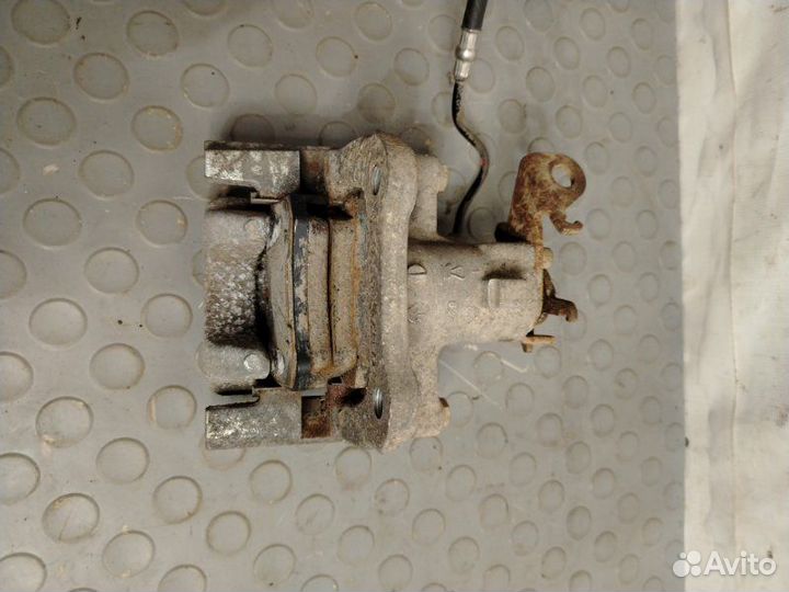 Суппорт задний правый Renault Fluence седан K4M