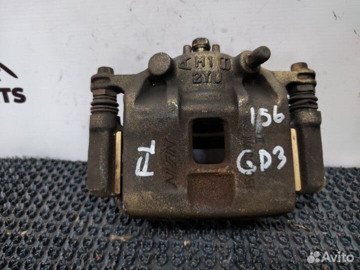 Суппорт тормозной передний левый Honda Fit GD3