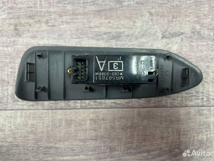 Кнопка стеклоподъемника Mitsubishi Lancer