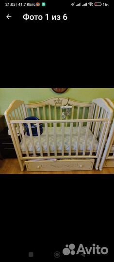 Детская кроватка с маятником и ящиком