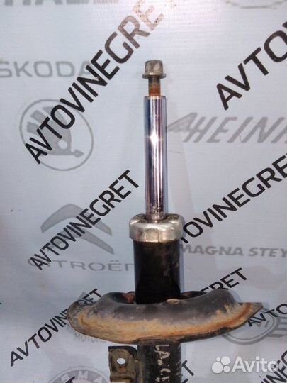 Стойка амортизатор Mitsubishi Lancer 10