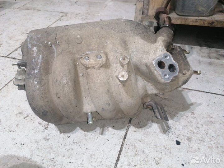 Впускной коллектор Mazda 323 BJ14M5 FP