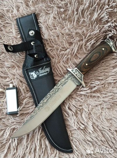 Нож