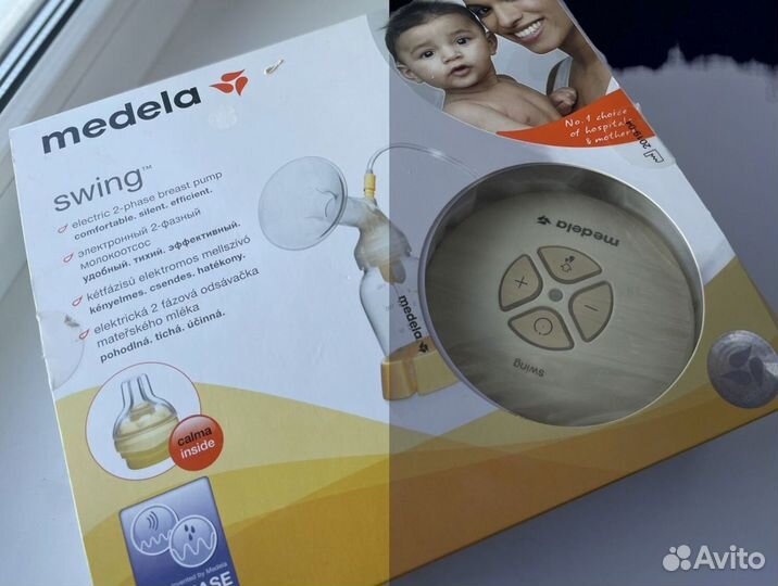 Молокоотсос medela swing электрический