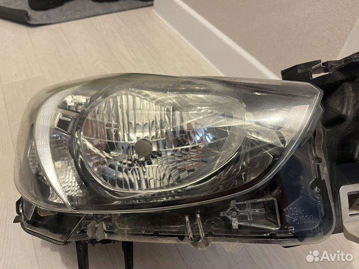 Фара левая + правая Mazda Demio DJ 10018368