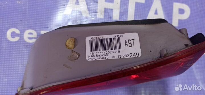 Фонарь в крышку багажника правый Opel Astra J