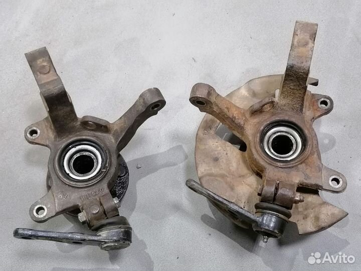 Кулак поворотный передний Kia Shuma 1996-2001