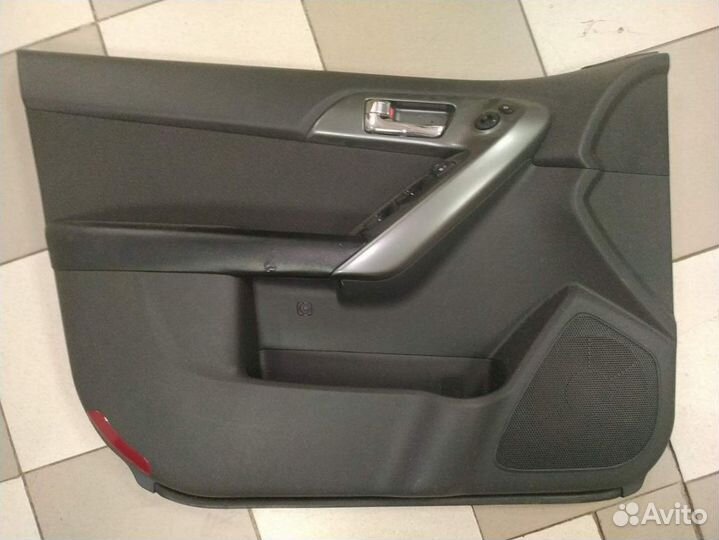 Обшивка двери передней левой Kia Cerato 2009-2013
