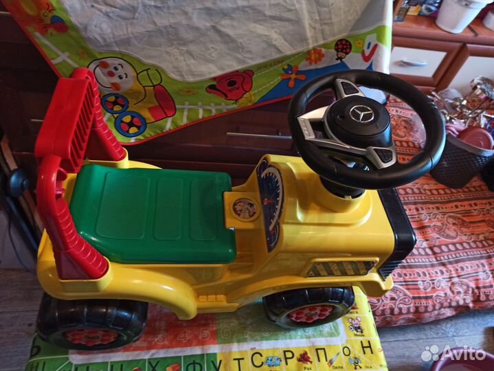 Детская машинка каталка с музыкой