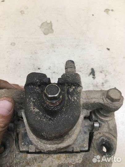 Суппорт задний левый Mazda CX-7