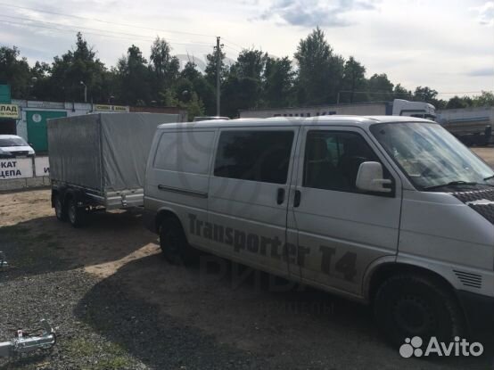 Двухосный прицеп 32.022 с тентом 150 см для бочек