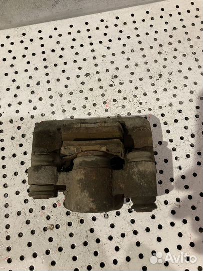 Суппорт тормозной задний левый Chery Tiggo (T11)