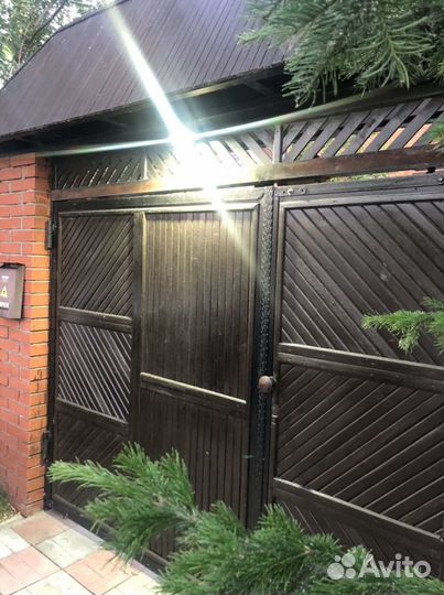 Секционные ворота с калиткой