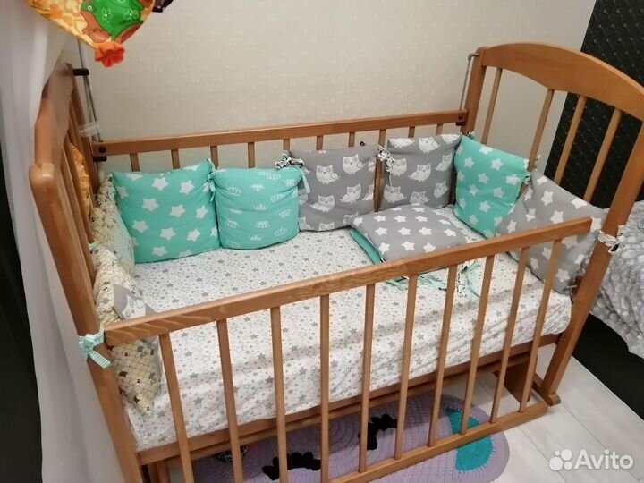 Детская кроватка с поперечным маятником