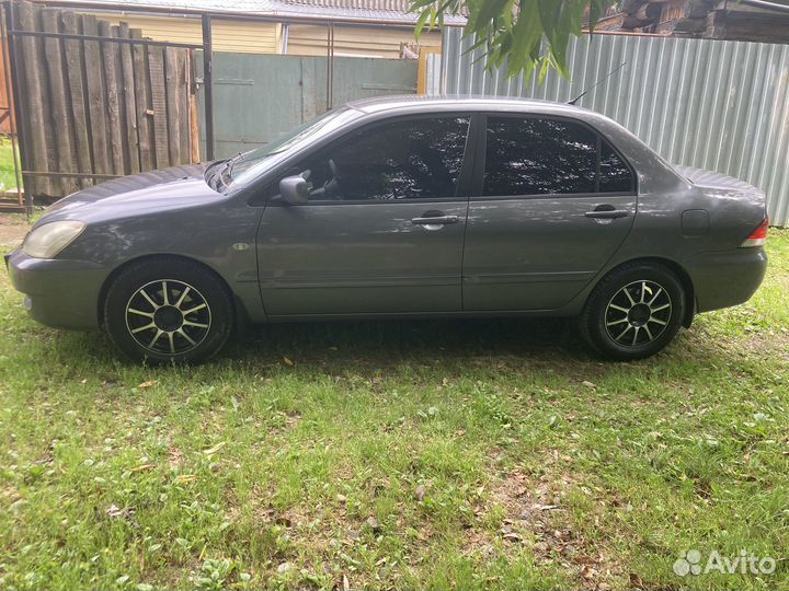 Mitsubishi Lancer 1.6 МТ, 2006, 200 000 км