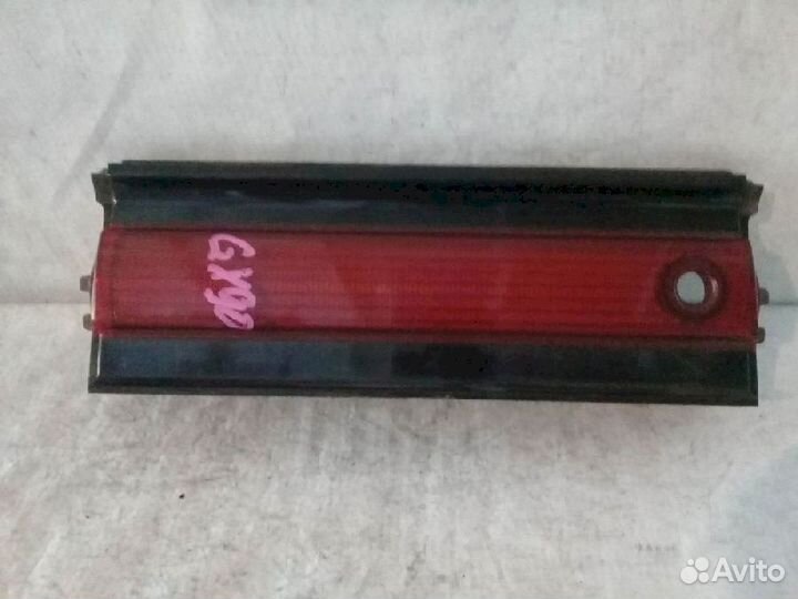 Вставка между фонарями задняя До рестаил/Koito Toy