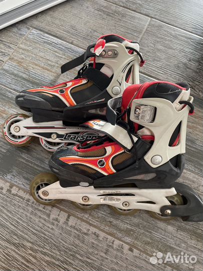 Роликовые коньки