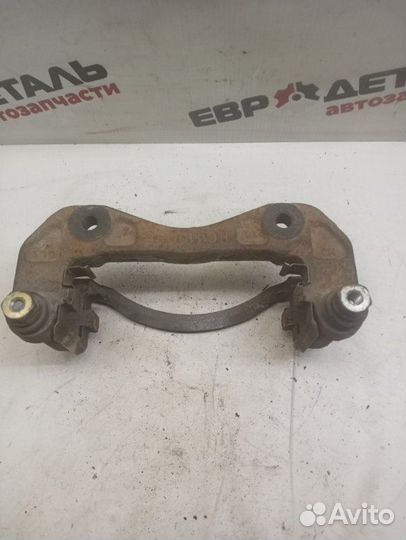 Скоба суппорта передняя правая Ssang Yong Kyron