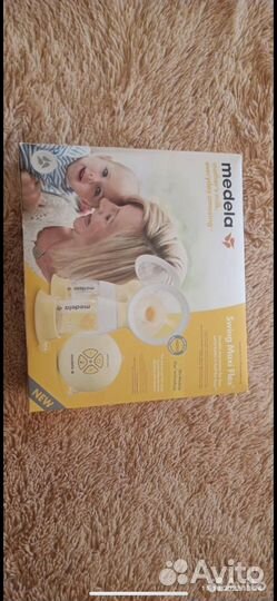 Молокоотсос электрический двойной medela