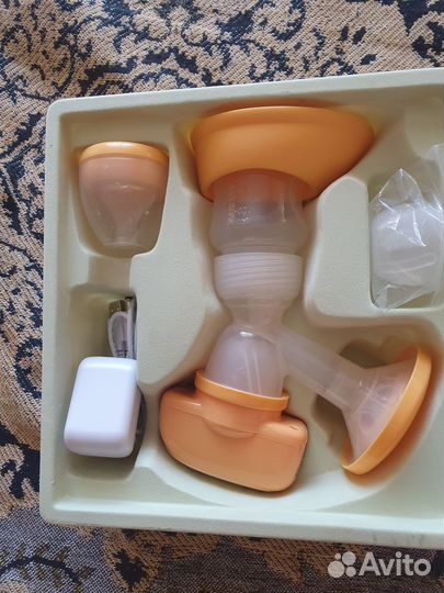 Молокоотсос электрический