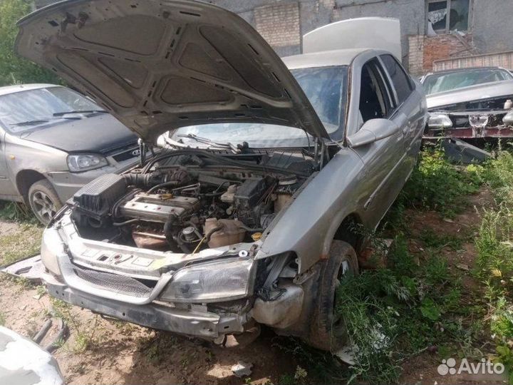 Амортизатор капота Opel Vectra B 1997