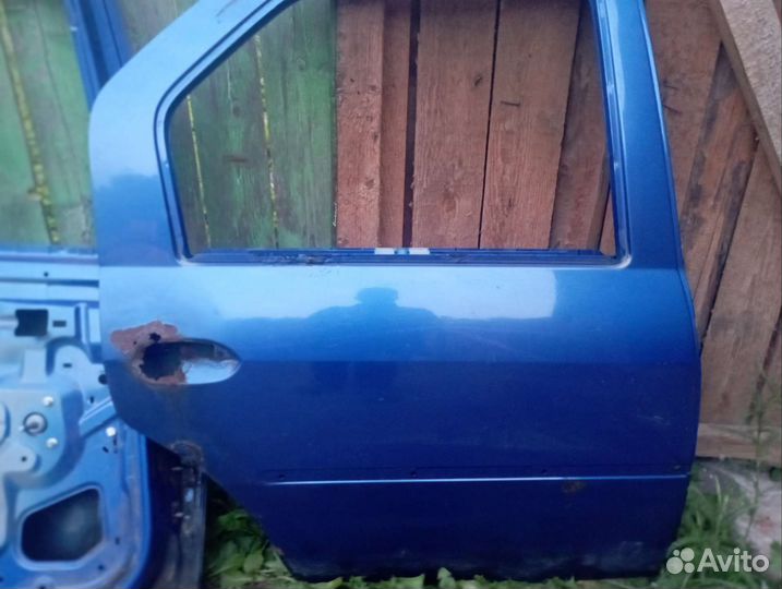 Дверь renault logan 1