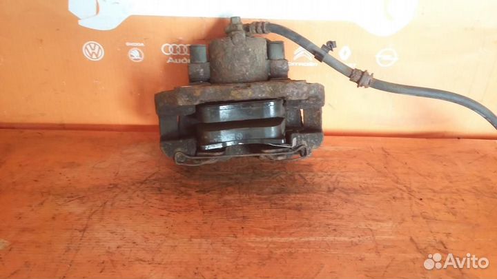 Суппорт передний правый Opel Astra H (2004-2014)