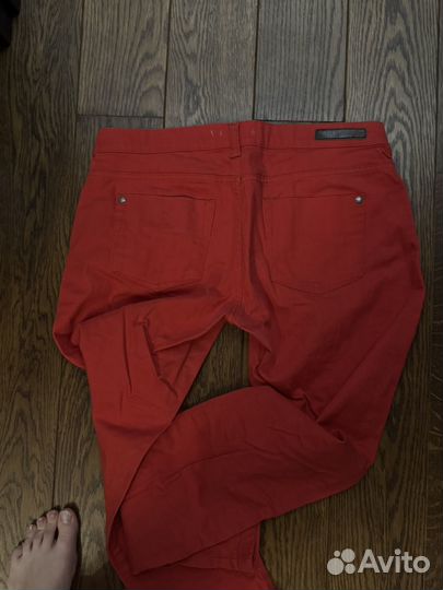 Оранжевые джинсы