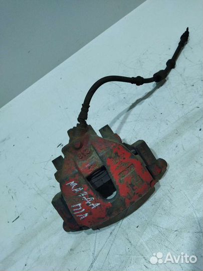 Суппорта передние Mazda 3 2004