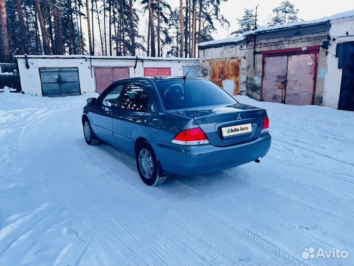 Mitsubishi Lancer 1.6 AT, 2009, битый, 290 000 км