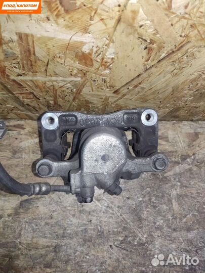 Суппорт тормозной задний левый Chevrolet Captiva