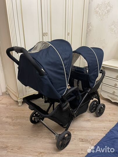 Коляска для погодок двойни