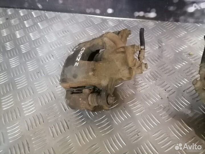 Суппорт передний Chevrolet Cruze 1.6