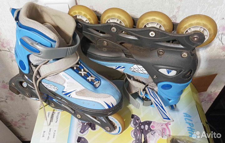 Роликовые коньки