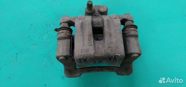 Суппорт задний левый Hyundai IX35 2010-2015