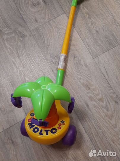 Игрушка каталка с ручкой