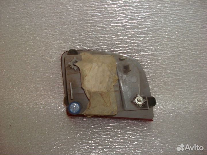 Фара противотуманная задняя левая Toyota Land Crui