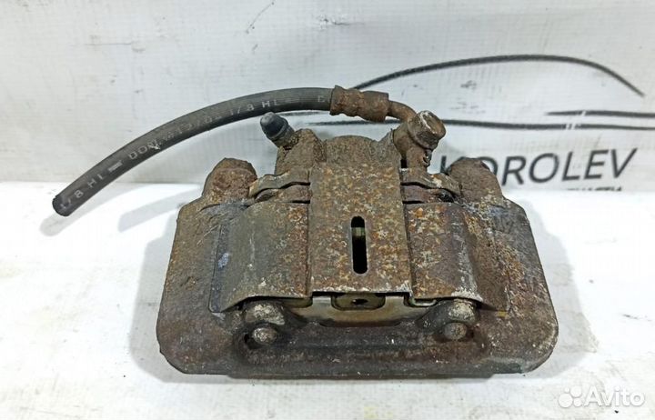 Суппорт тормозной задний левый Toyota RAV4 2