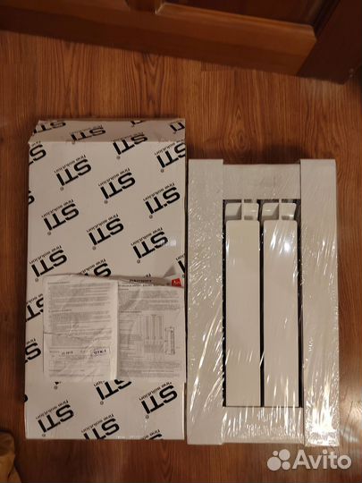 Новый Радиатор биметалл Sti 4 секции