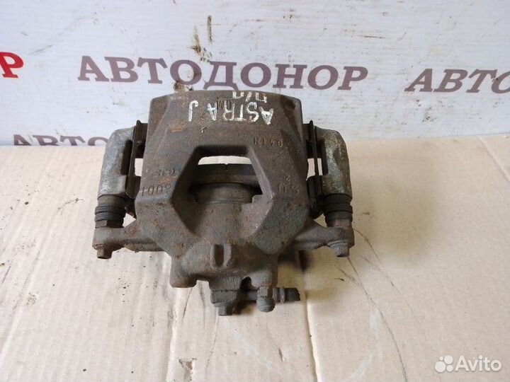 Суппорт тормозной передний правый Opel Astra J