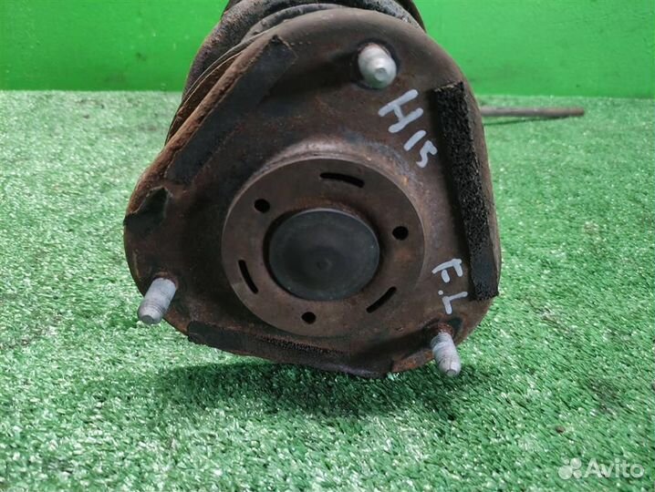 Стойка амортизатора передняя левая Toyota Auris E