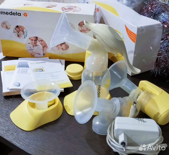 Молокоотсос medela