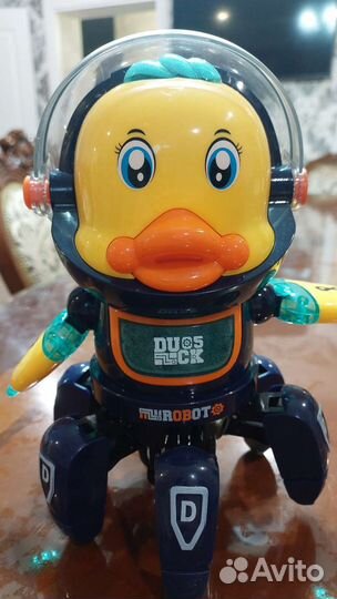 Игрушка музыкальная робот космонавт