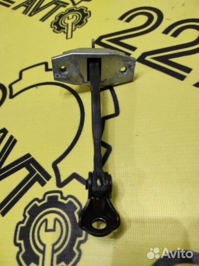 Ограничитель двери задний левый Toyota Corolla