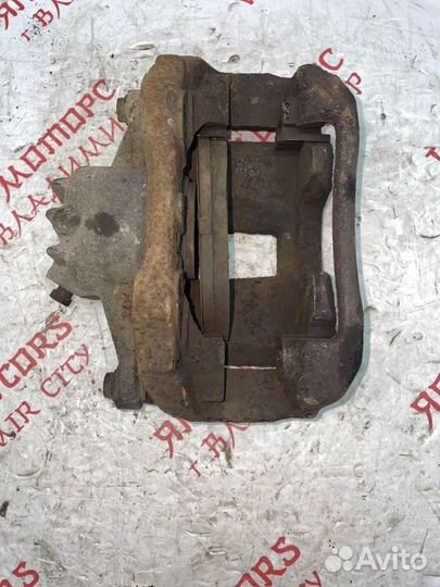 Суппорт тормозной передний левый Peugeot 207 EP6