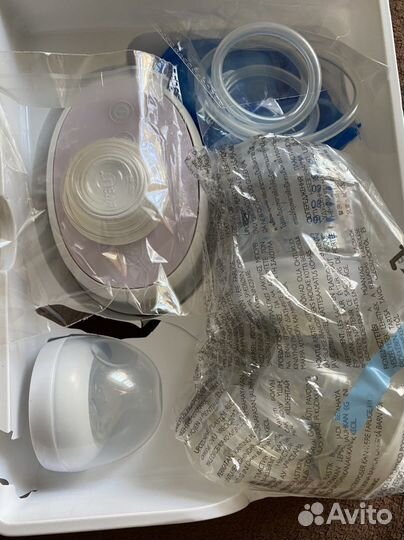 Молокоотсос электрический новый