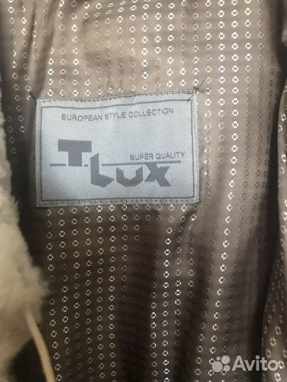 Меховая жилетка