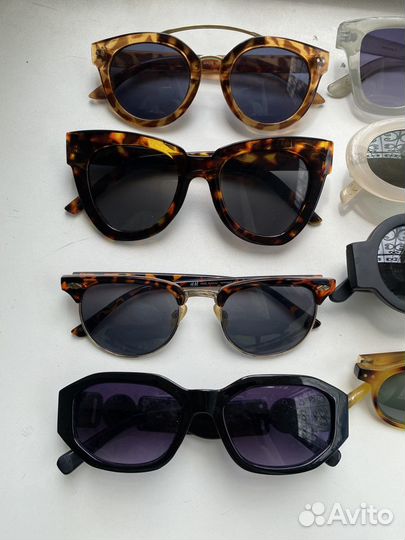 Солнцезащитные очки много